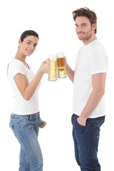 Wall Mural - Attractive couple clinking glasses smiling