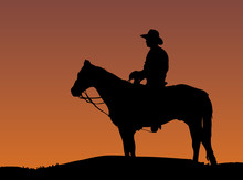 Cowboy On Horse At Sunset