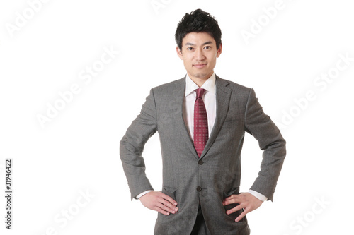 腰に手を当てるスーツの男性 Buy This Stock Photo And Explore Similar Images At Adobe Stock Adobe Stock