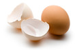 Egg and eggshell on the white background
