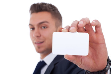 Business man handing a blank business card