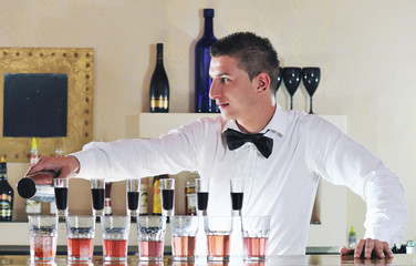 pro barman prepare coctail drink on party