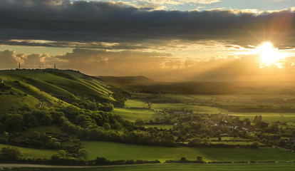 Wall Mural - Stunning Summer sunset over countryside landscape