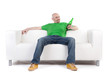 © Renee Jansoa - Man on sofa holding beer