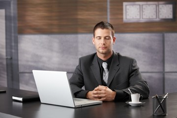 Canvas Print - Top manager meditating in elegant office