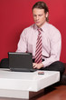 © Tyler Olson - Concentrated businessman using a laptop