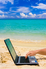 Sticker - Computer and hand on beach