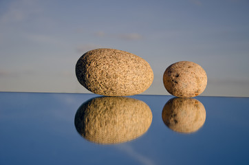 two stones on mirror