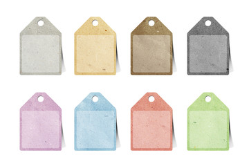 Wall Mural - tag recycled paper craft stick on white background