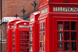Fototapeta Sawanna - A row of London phone booths