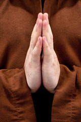 Wall Mural - Monk with two hands clasped in prayer