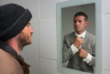 Unemployed Man Looking In Mirror And Seeing The Future