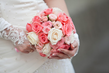 Bride with bouquet, closeup