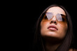 © cristovao31 - close-up portrait of sexy woman in sunglasses over dark backgrou