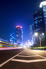 Poster - light trails on the ramp with building background