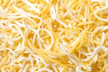 Shredded Monterey Jack And Cheddar Cheese Closeup Background
