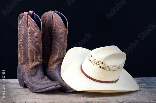 Fotografia, Obraz cowboy boots and cowboy hat still life