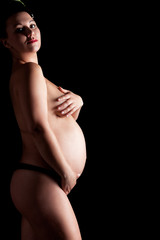 Wall Mural - Beautiful adult pregnant woman