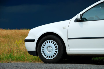 Wall Mural - white car on the background field