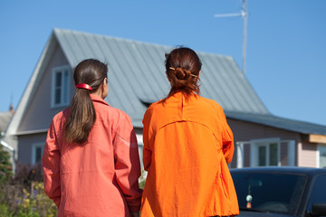 two women looking new home