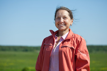 Outdoor portrait of  mature woman