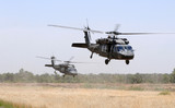 Fototapeta Miasto - Military Helicopter Team