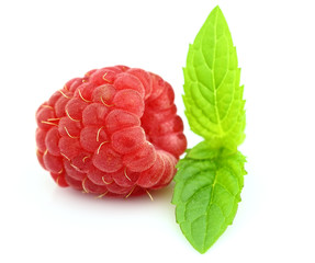 Wall Mural - Fresh raspberry with leaves of mint