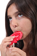 Girl eating a lollypop