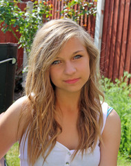 Wall Mural - stunning teenage girl  in garden