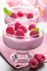 Wall Mural - dessert with fresh raspberries