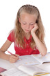 © mariesacha - fillette blonde de 9 ans faisant ses devoirs, ennuyée