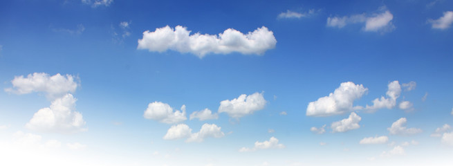Wall Mural - blue sky with clouds and sun