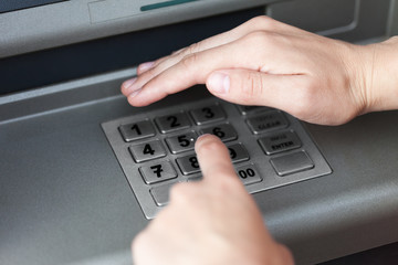 Entering atm cash machine pin code