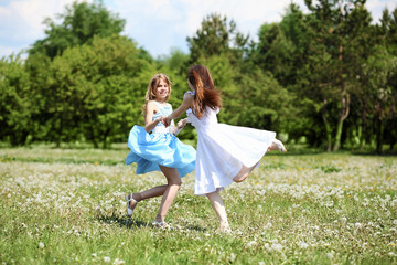 two girls playing in the park