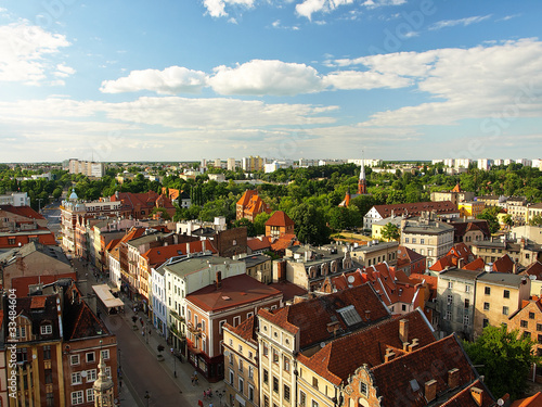Board z aluminiowym obramowaniem Panorama Torunia, Polska.