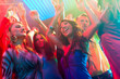 © Kzenon - Party people dancing in disco or club
