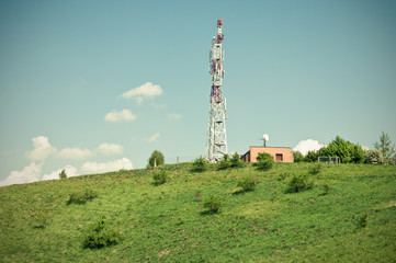 Wall Mural - Green scene with transmitter on the hill