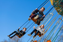 Teens On The Chain Swing Carousel