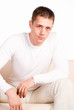 © aletia2011 - smart guy sits at sofa
