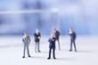 © ZoomTeam - Miniature figurines of successful business team.