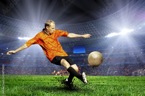 Naklejka na szybę Football player on field of stadium