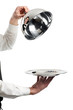 hands of waiter with cloche lid cover