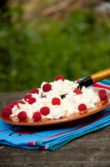 Wall Mural - Cooking  curd with raspberry with their hands