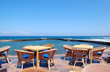 Fototapeta Do akwarium - Outdoor restaurant at the seafront, Tenerife island, Spain