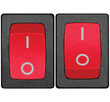 Red power switch on off position, isolated macro closeup