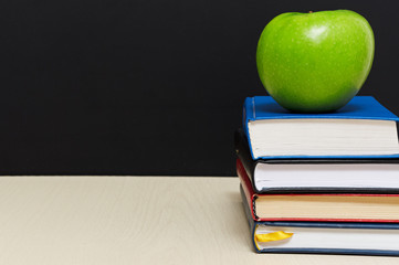 books and an apple