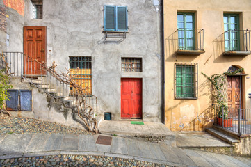 Wall Mural - Wooden multicolored doors in the house in Saluzzo.