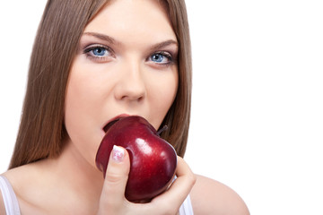 sensual woman biting apple