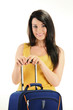 © monticellllo - Young woman with suitcase isolated on white