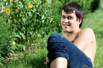 Wall Mural - Portrait of young attractive man, outdoors